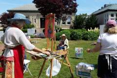 Ruth Leech with the Friday Figure Painters on the Library Lawn